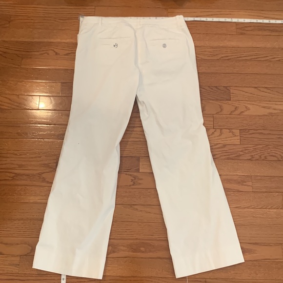 Modern boot cut, white, wide-leg pants. - Picture 11 of 12